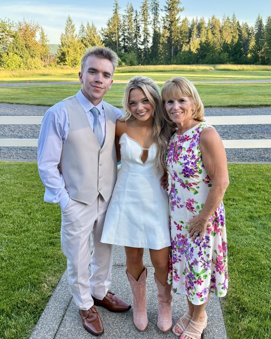 Rhonda with a couple after their ceremony